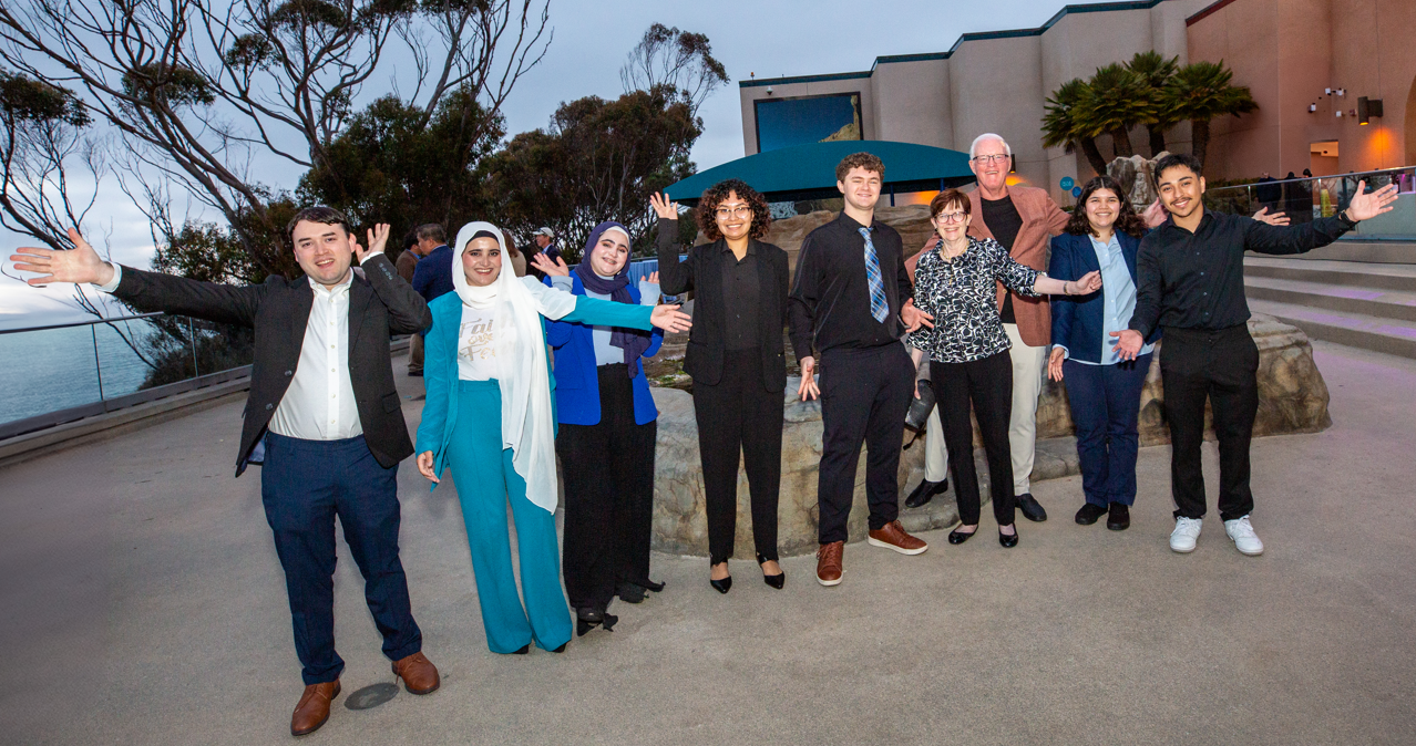 group of scholars and donors smiling